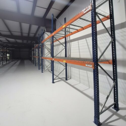 Row of Pallet Racking with standard waterfall wire mesh decks for the shelves