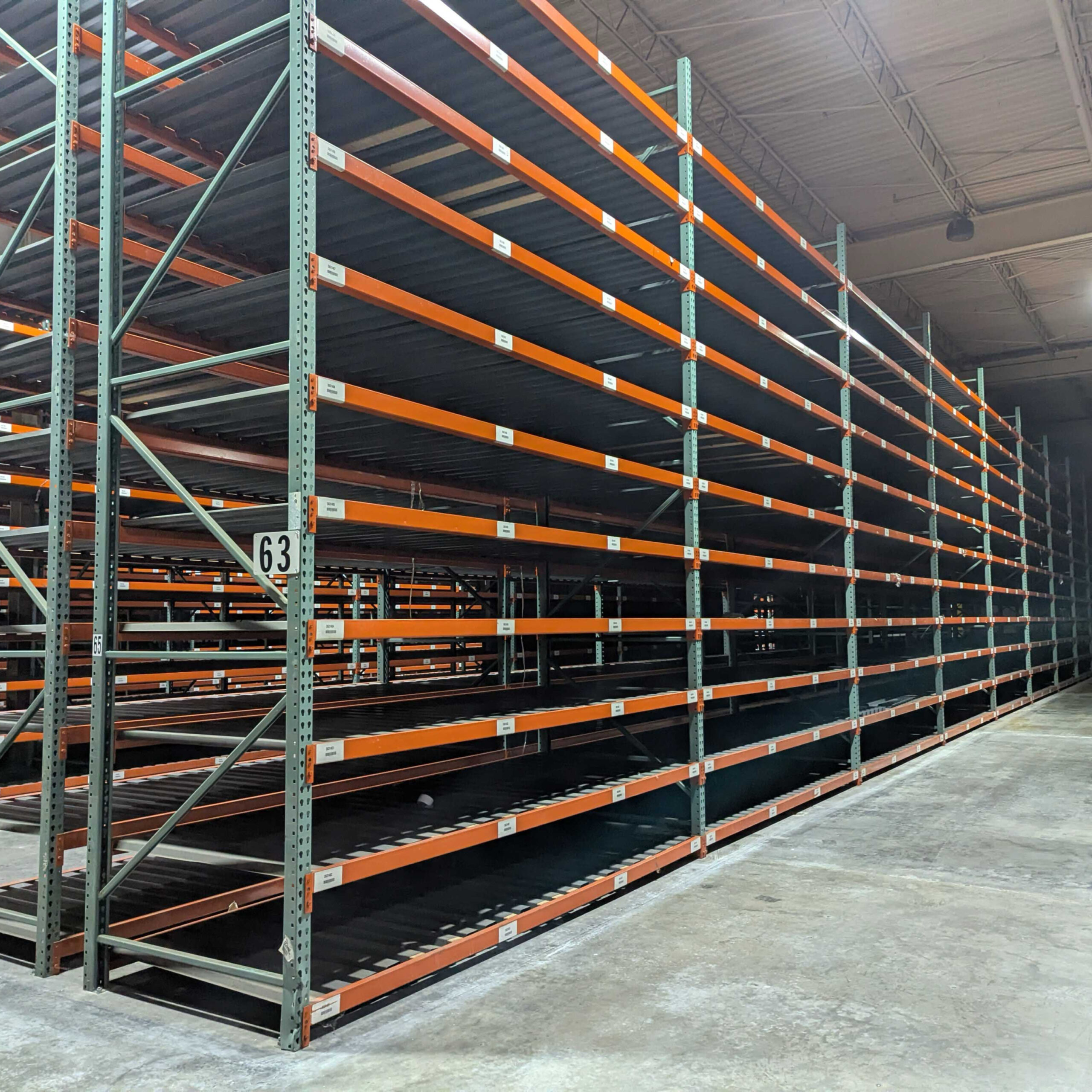 Used warehouse pallet racking systems, 12' long teardrop beams